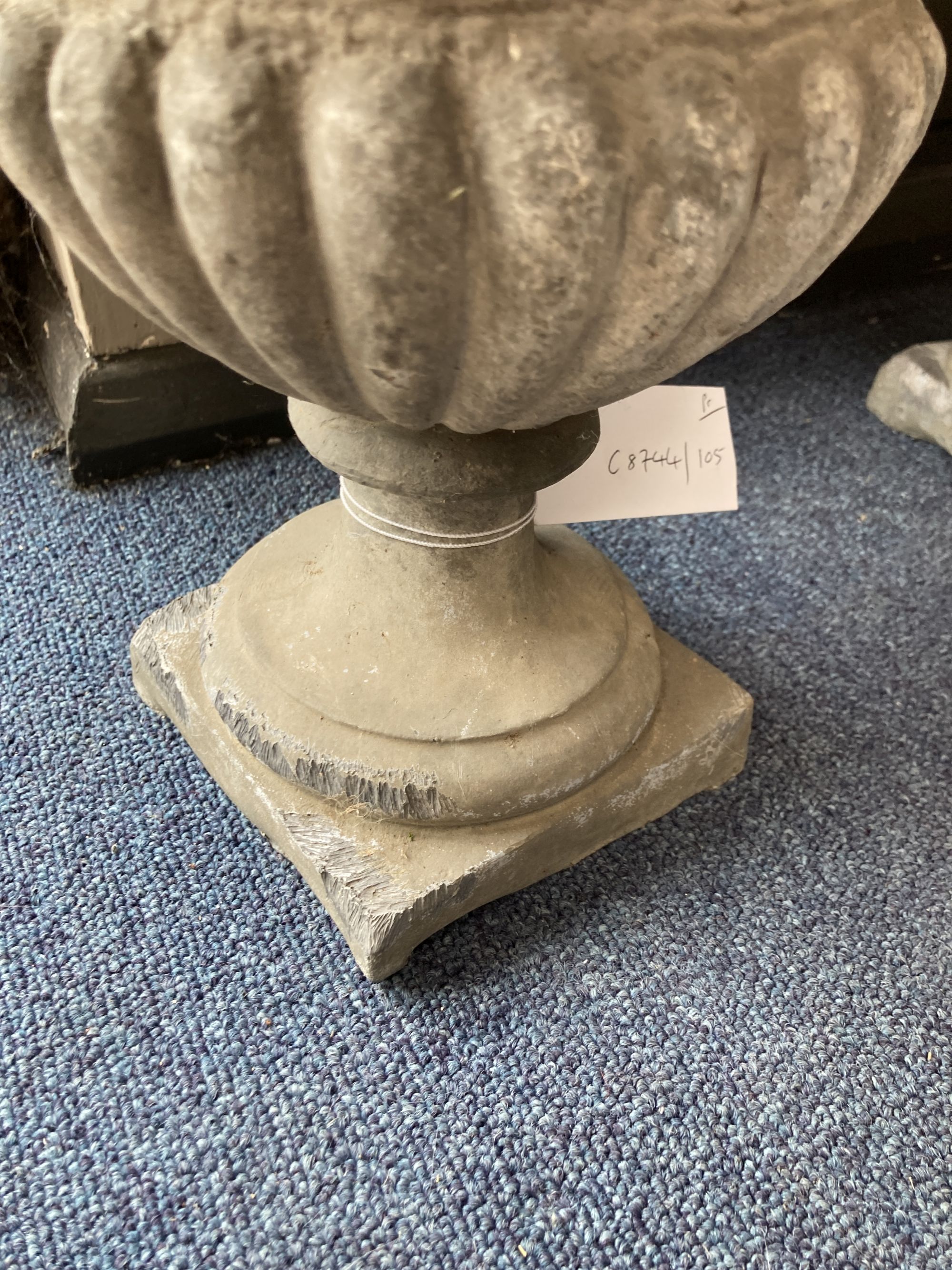 A pair of lead campana garden urns, 28cm diameter, height 36cm